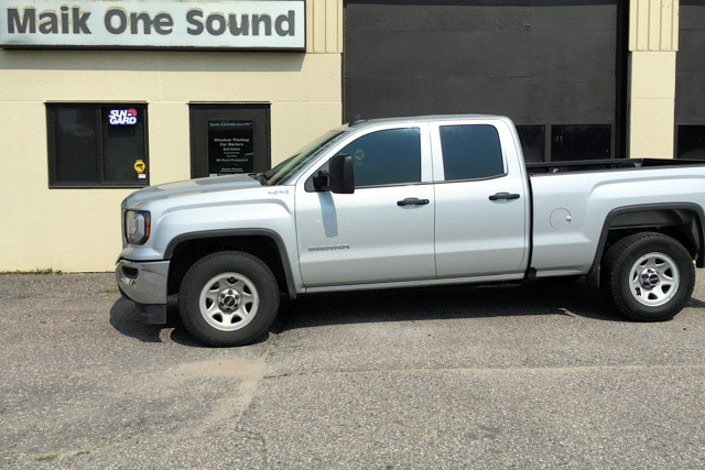 2018 GMC Sierra with professional window tint in North Bay